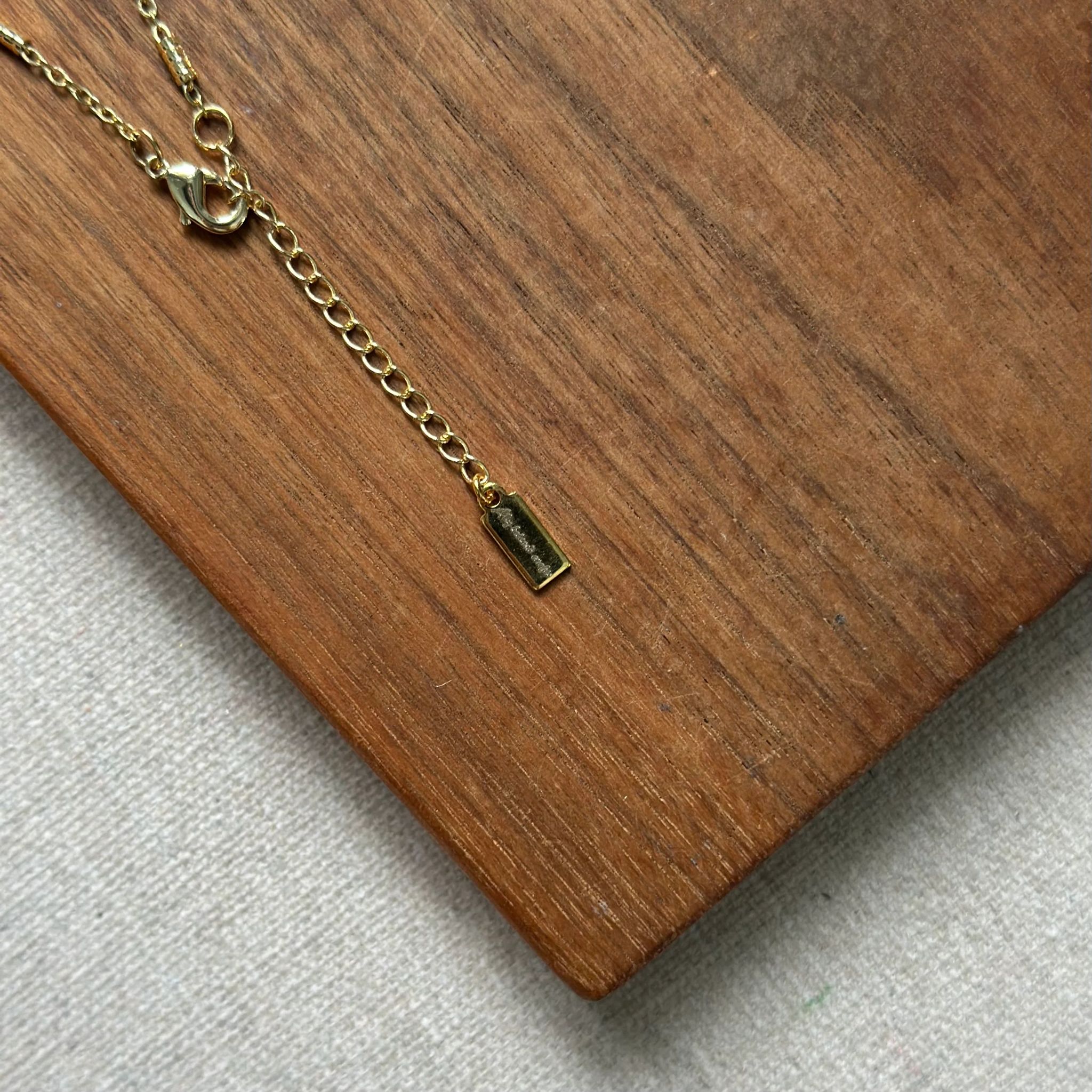 Turquoise Curved Gold-plated Necklace - Image 3